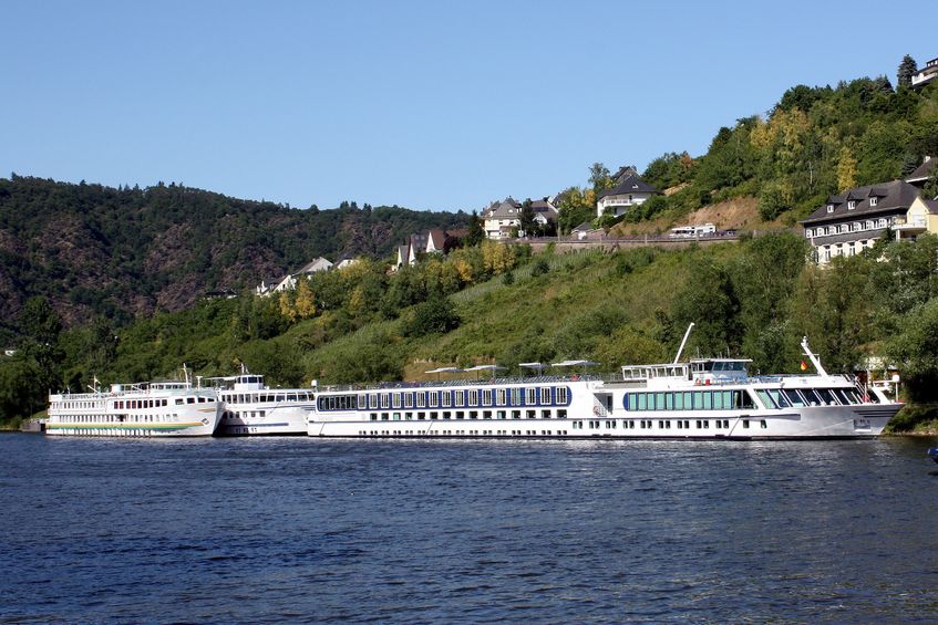 cruise ships on the moselle river near cochem germany